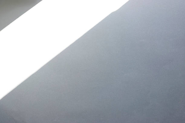 Minimal Abstract Light and Shadow on White and Gray Wall for Modern Interior Stock Photo