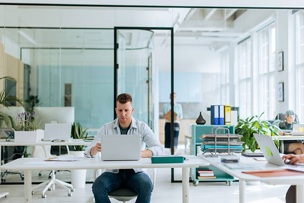 istock Man Working on Laptop in Office 2237324475