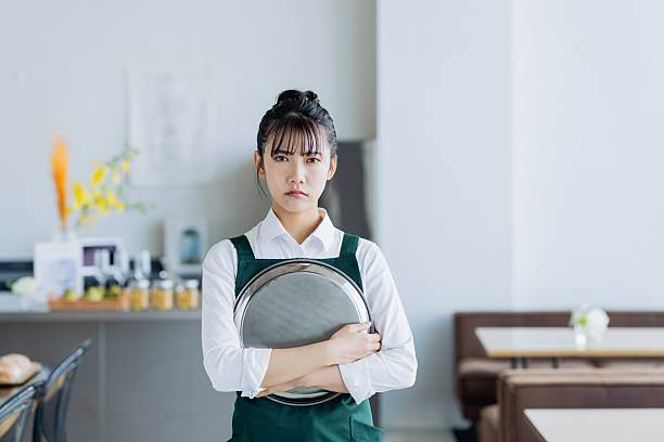 Young woman working in a cafe