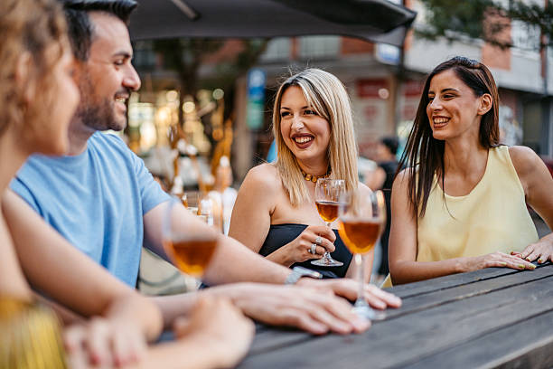 istock A Small Group Of Friends Drinking White Wine In A Bar 2237325257