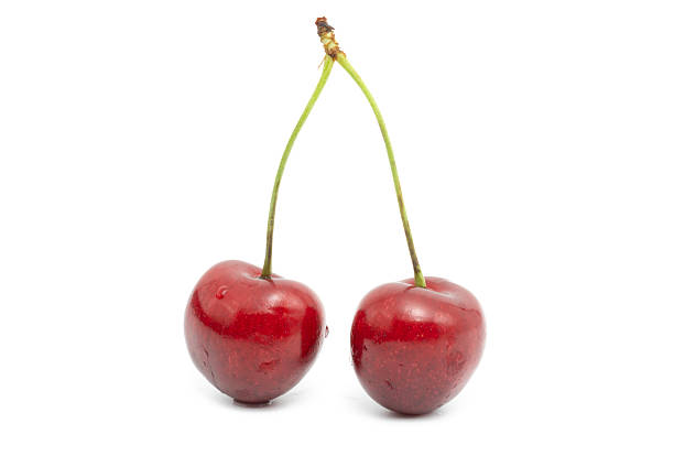 istock Ripe sweet cherries isolated on white background. 2237329506