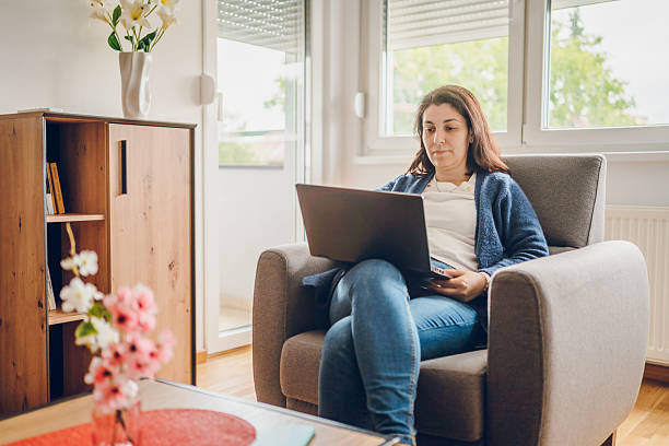 istock Beautiful woman working from home 2237329674