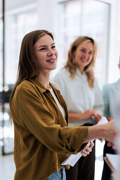 istock Business Woman Shaking Hands in Office 2237329744