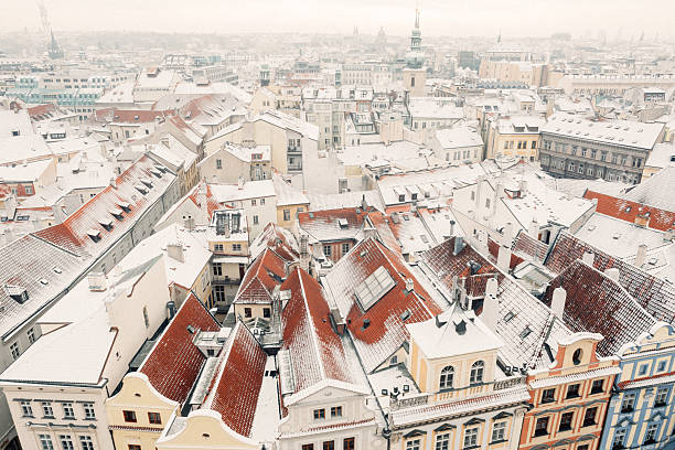 istock Winter Wonderland: Snow-Covered Rooftops in a Historic City 2237329839