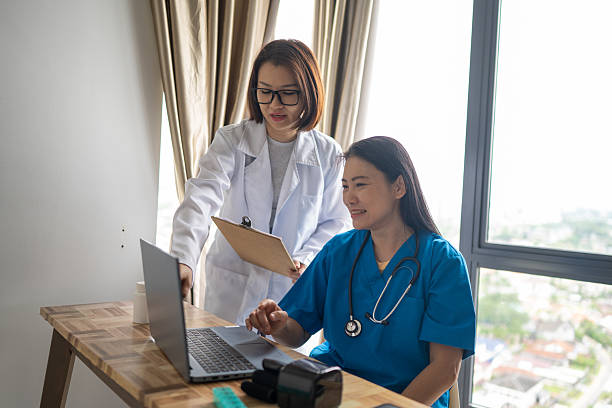 istock Two Female Doctors Consulting on Patient Care 2237331740