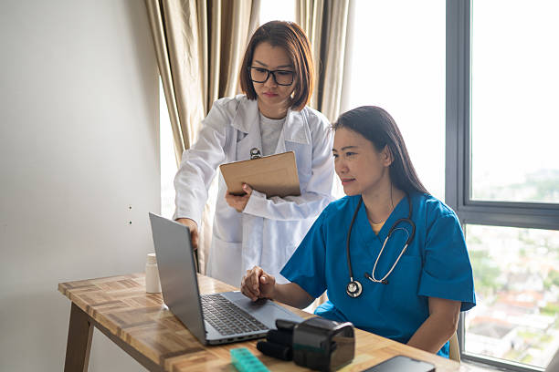 istock Doctors Examining Patient’s Medical Chart 2237331794