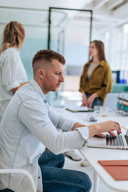 istock Focused Male Employee Working on Laptop 2237331838