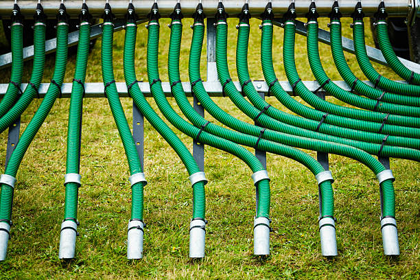 Agriculture equipment. Seed drill or manure spreader, agricultural machinery, detail view.