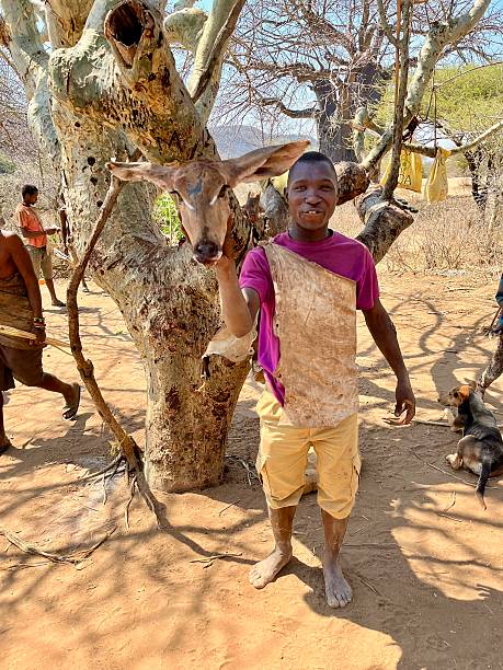 Tanzania - Hazdabe tribeMale hunters from the Hazdabe tribe with an antelope's heada protected hunter-gatherer Tanzanian indigenous ethnic group, primarily based in Baray, an administrative ward within Karatu District in southwest Arusha Region. They live around the Lake Eyasi basin in the central Rift Valley and in the neighboring Serengeti Plateau.September 25, 2025
