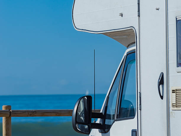 istock Rv motor home camping on beach 2237334460