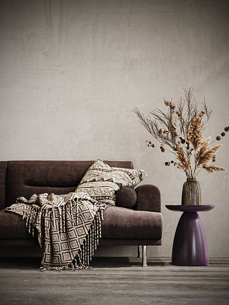 istock Modern interior design. Sofa with dry plant decoration on concrete wall background. 2237337267