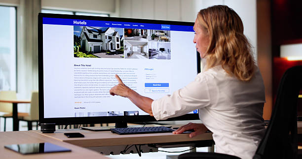 istock Woman Booking Discount Hotel Online Using Laptop Device 2237337948