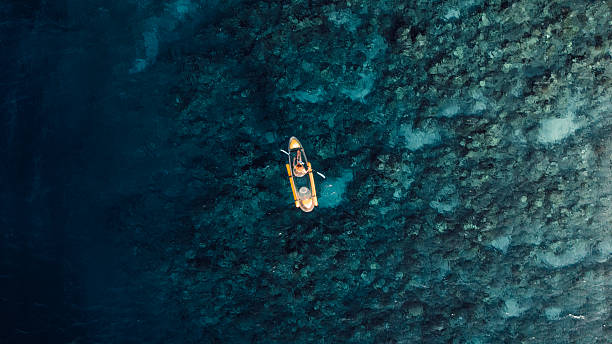 istock Swimming on kayak in blue ocean. Drone view 2237337973