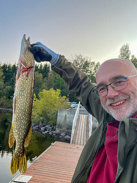istock Proud mature fisherman 2237341479