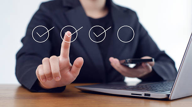 istock Businesswoman mark checkboxes, Survey form, check marks on checklist,Checklist concept. 2237341563