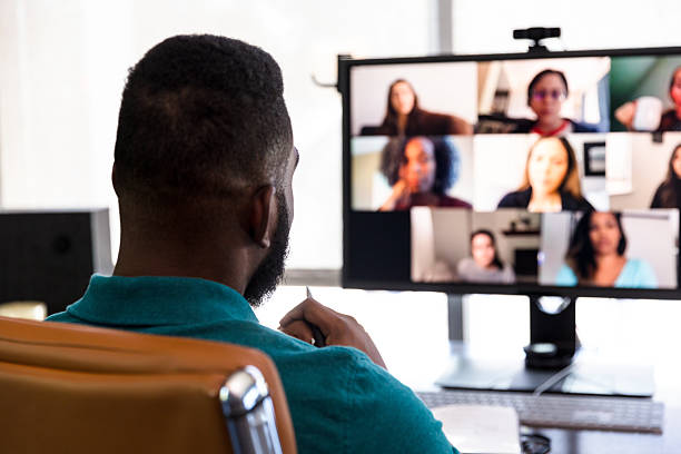 istock African-American Man in Video Conference with Diverse Team 2237343413