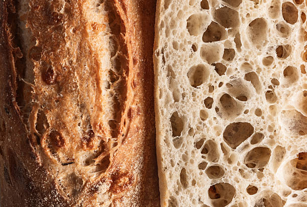 Crusty Baguette Slices On Dark Background Fresh Bakery Sourdough Bread Close-Up For Food Photography