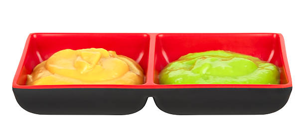 Wasabi and mustard sauce isolated on a white background