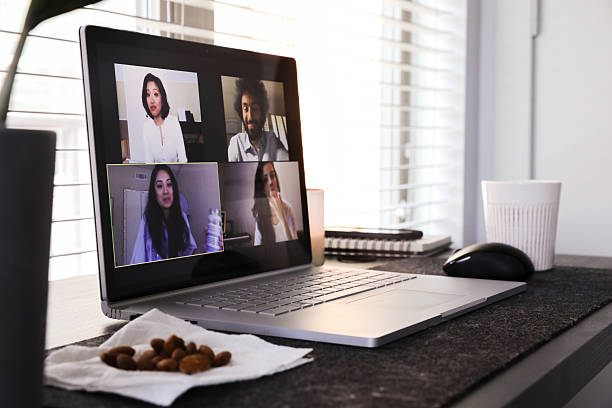 istock Multiracial Group Video Conference Meeting on Laptop 2237348390