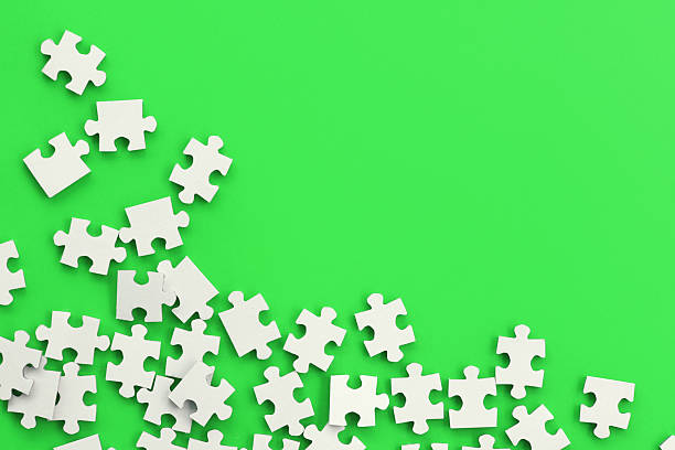 istock Puzzle Pieces Green Screen 2237350386