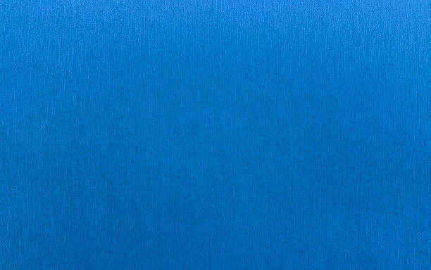 istock Vibrant, blue fabric with a subtle vertical weave texture. This high-quality, seamless textile background is perfect for creative projects, upholstery. 2237350577
