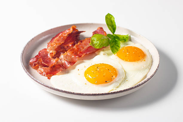 istock Delicious traditional English breakfast with fried eggs and bacon 2237353826