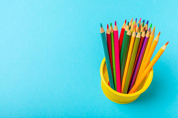 istock Colored pencils on a bright colored background. Equipment for coloring. Stationery for creativity.Back to school. Flatlay. Children's Creativity and Education. Rainbow.Space for text. Copy space. 2237355667