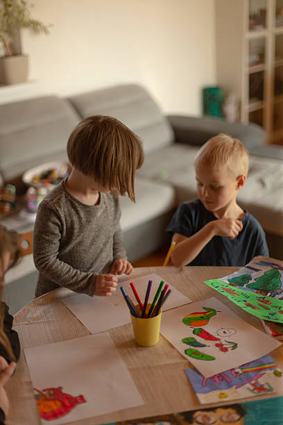 istock Happy siblings play together at home, sharing laughter, strong emotional bond 2237356439