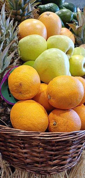 istock Various fruits in a wicker basket, orange, apple, grapefruit 2237356507