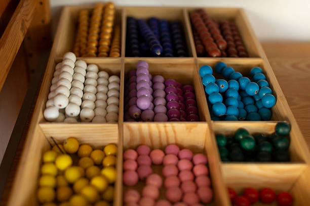 Close-up of didactic materials in an alternative primary school classroom. Hands-on learning tools.