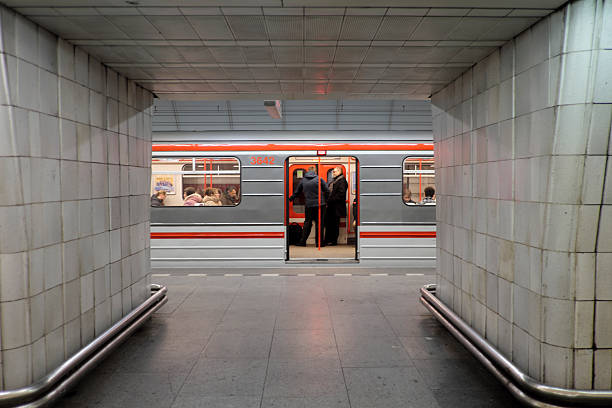 Moving blurred train in subway station.