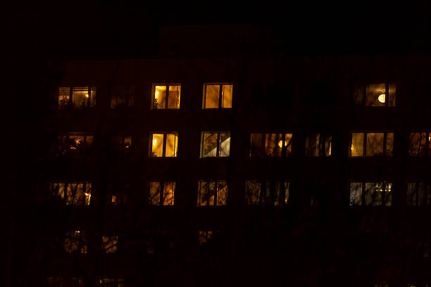 istock A Beautiful Night View of an Apartment Building with Its Lit Windows Showing 2237366876