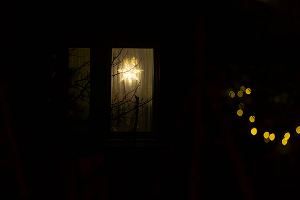 istock A Beautiful Window at Night Adorned with Stars and Twinkling Lights 2237367055