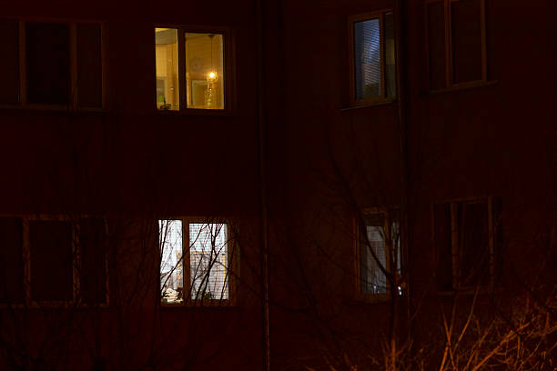 istock An Enchanting Night View of Apartment Windows Illuminated with Light 2237368088