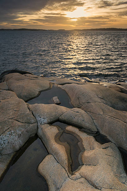 istock Sunset by the sea 2237368120