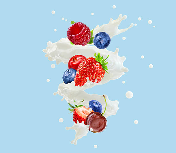 istock Fruits and milk splash, blue background. 2237370461