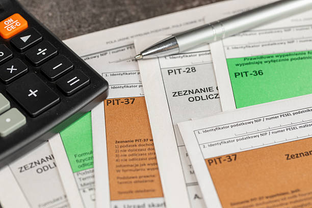 istock Completing the tax return called PIT. Annual tax settlement in Poland. 2237389998