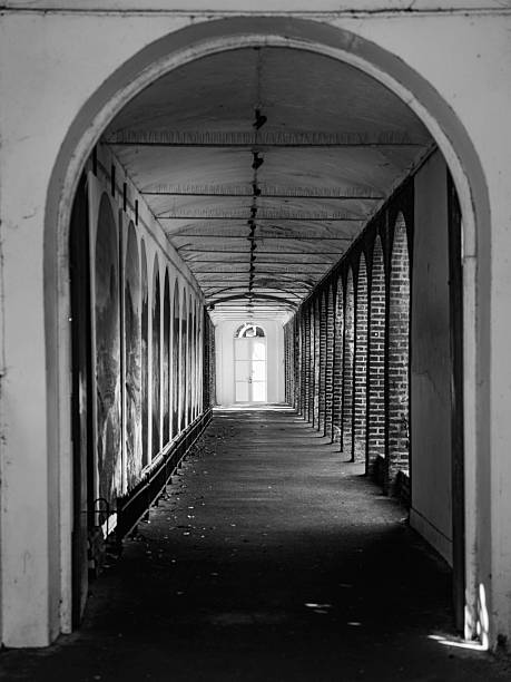 istock Abstract geometry and symmetry of corridors 2237391132
