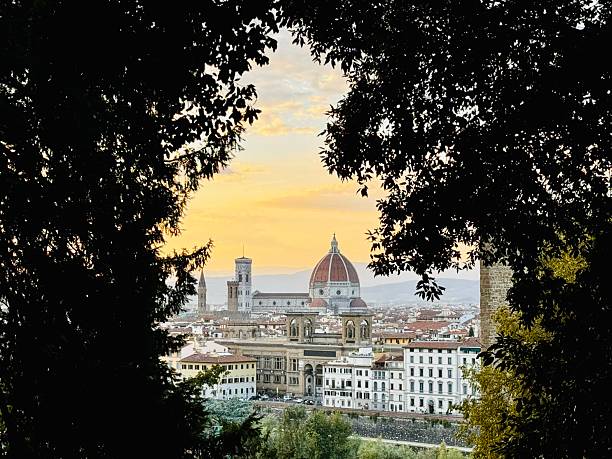 istock Florence Cityscape Framed by Lush Trees at Dusk 2237401144
