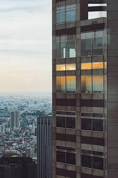 istock Tokyo skyscraper reflecting sunset light over urban cityscape 2237415338