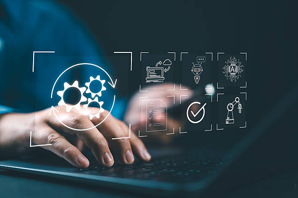 istock Robotic Process Automation (RPA) technology to automate business tasks with AI. Concept with expert setting up automated software on laptop computer. Digital transformation and change management. 2237417753