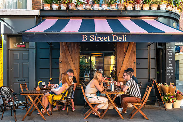 Tel Aviv Yafo - Nov 22 2022:Young adult Israeli people dining in cafe restaurant in Kerem Ha Teimanim neighborhood.In Tel Aviv 45% of the men and 38% of the women are single.