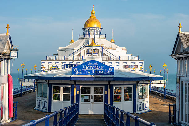 Ornate buildings on the Eastbourne Pier, East Sussex, UK, on a sunny day.