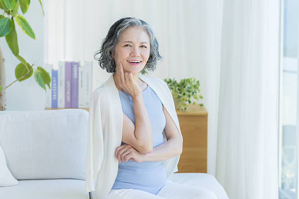 istock Senior woman doing skin care 2237421514
