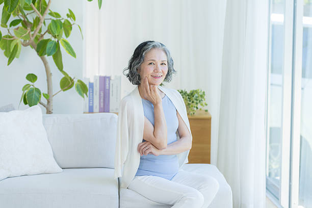 istock Senior woman doing skin care 2237421517