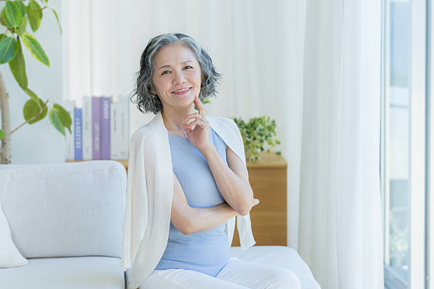 istock Senior woman doing skin care 2237421528