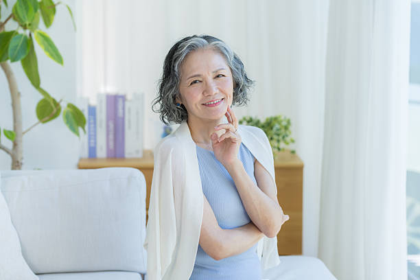 istock Senior woman doing skin care 2237421544