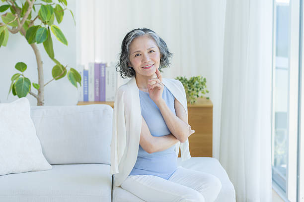 istock Senior woman doing skin care 2237421545