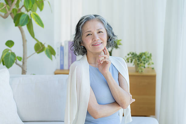 istock Senior woman doing skin care 2237421547