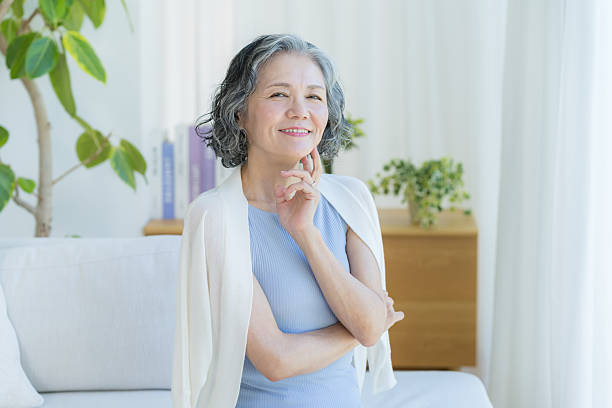 istock Senior woman doing skin care 2237421549